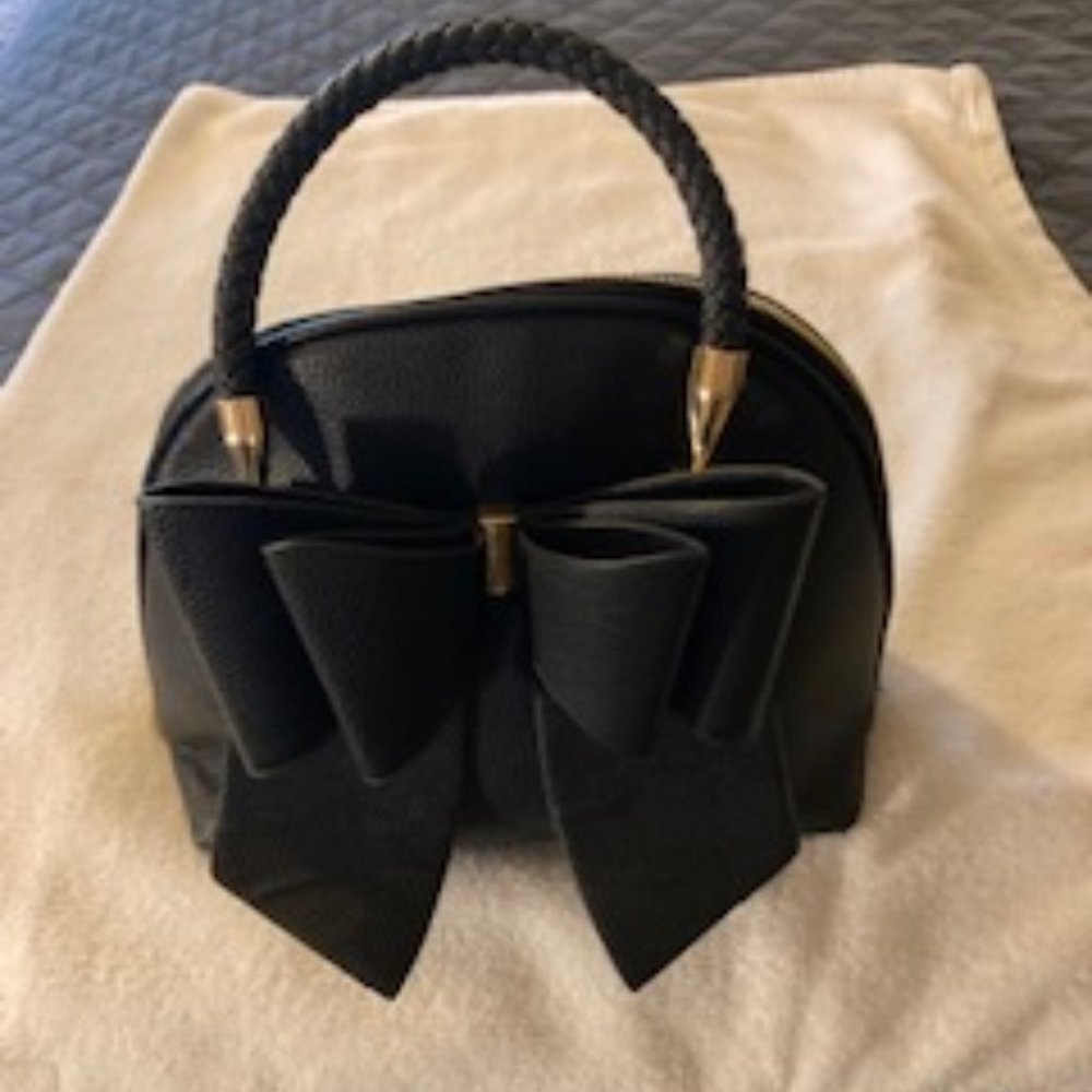 Like Dreams small black handbag with double bow. I pay shipment fees